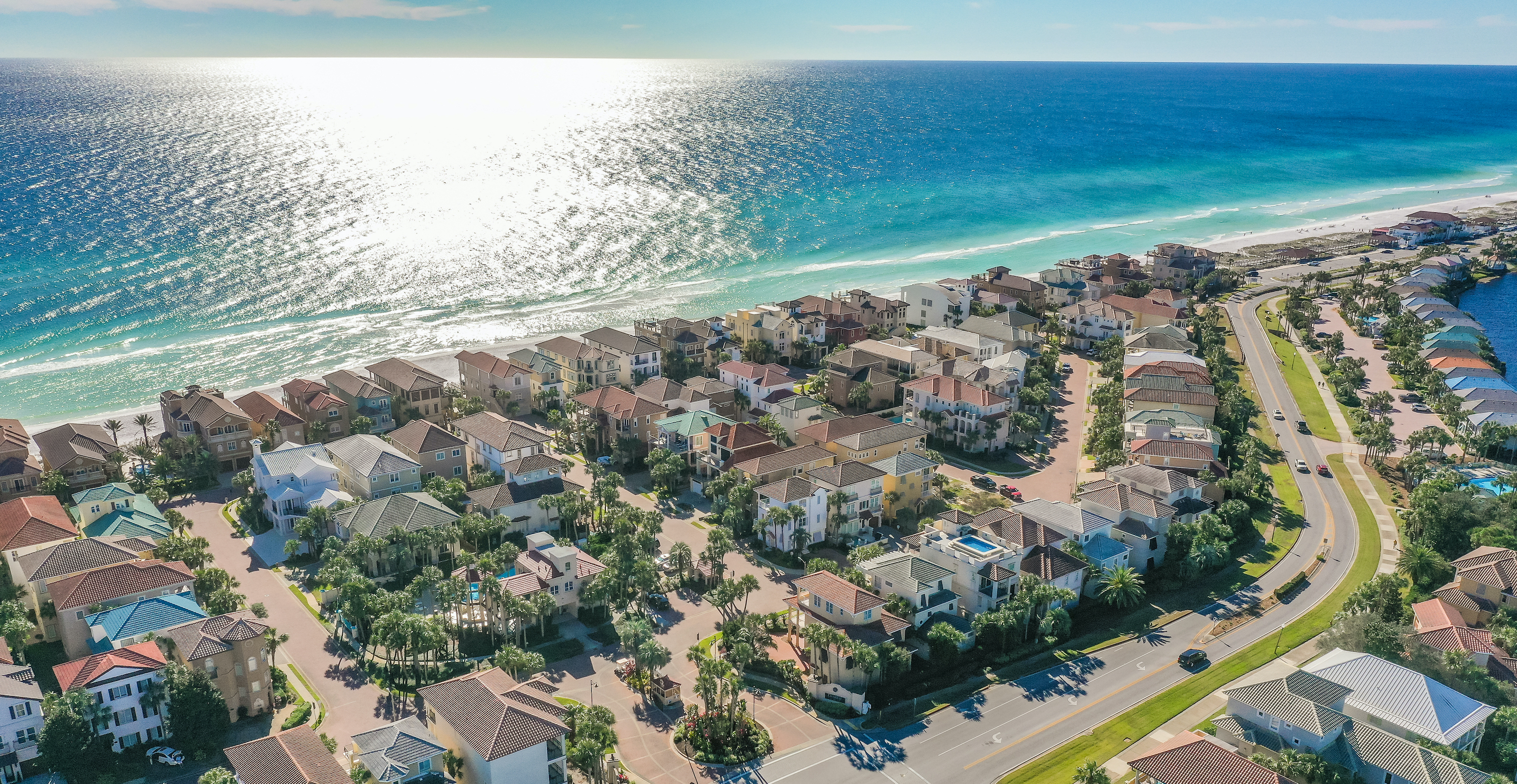 A peaceful aerial view of the Destiny By The Sea community homes along the Gulf
